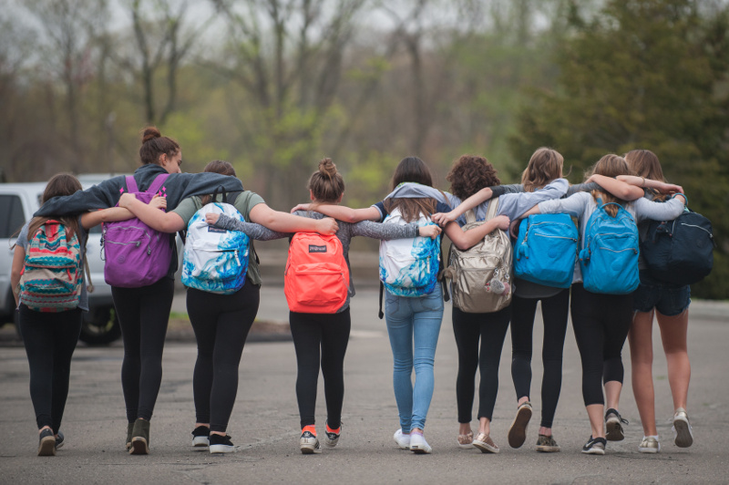 GoKid Pro announcement - image of row of girls in backpacks