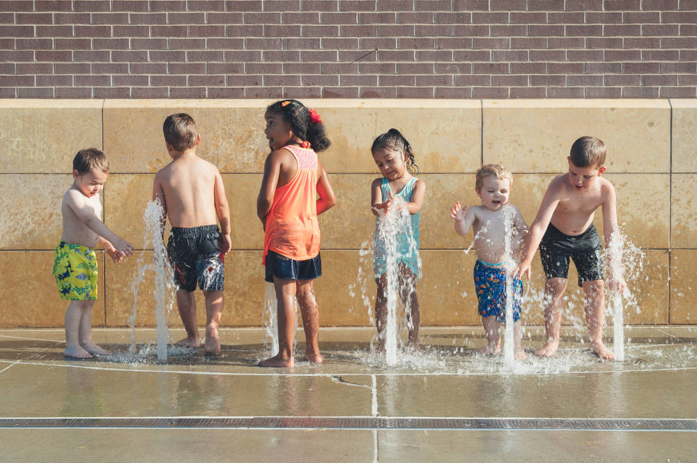 kids playing in splash pad